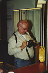 Brian Pawlowsky checking out his camera 