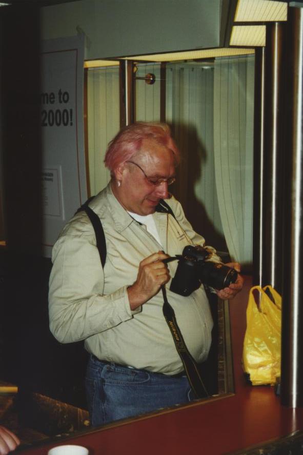 Brian Pawlowsky checking out his camera 